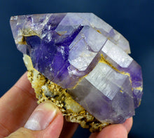 Deep purple amethyst crystal specimen with a small chip from Pakistan.