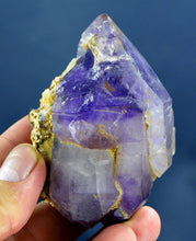 Deep purple amethyst crystal specimen with a small chip from Pakistan.