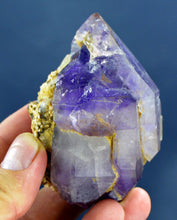 Deep purple amethyst crystal specimen with a small chip from Pakistan.