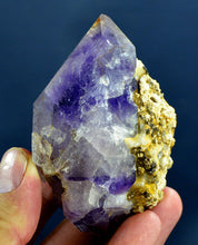 Deep purple amethyst crystal specimen with a small chip from Pakistan.